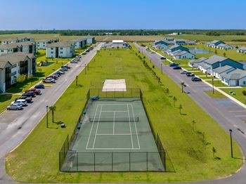 Aerial view of tennis court  at the reserve of foley apartments in foley, al